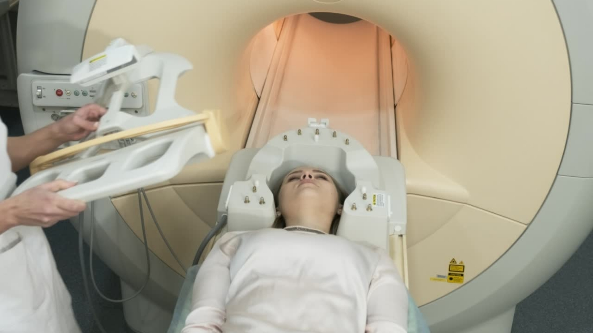 MRI scan patient, multicoil neurovascular scan, magnetic resonance imaging, brain mri scan